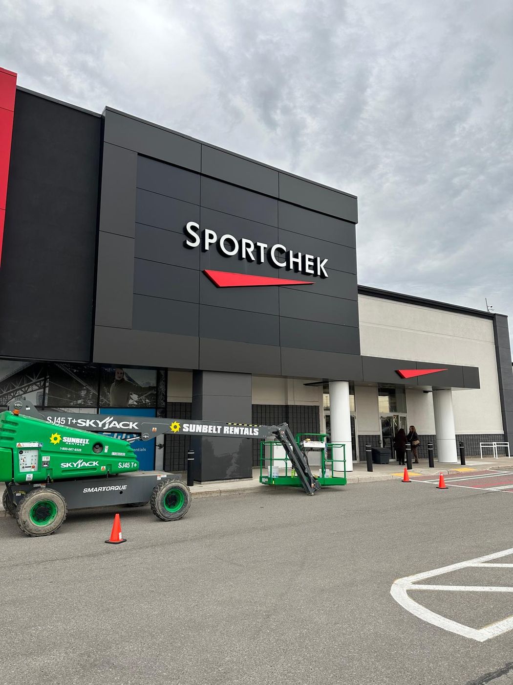 SportChek storefront with black ACM metal panel facade